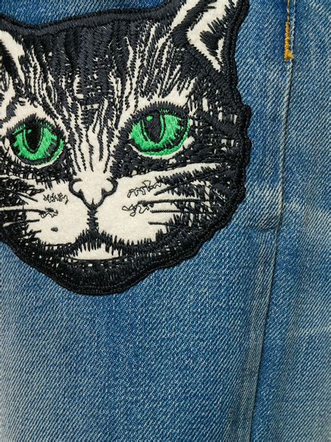 gucci cat jeans